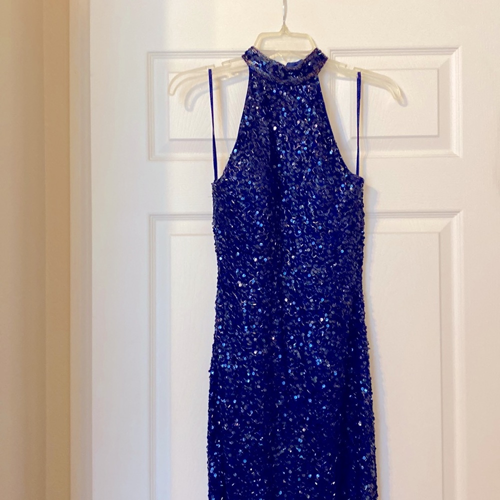 Sparkly dark blue long evening gown.